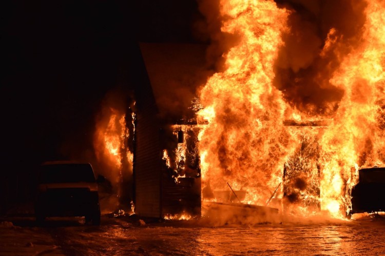 A garage at 107 Benson Road in West Gardiner was fully engulfed in flames when firefighters arrived shortly after 11 p.m. Wednesday.