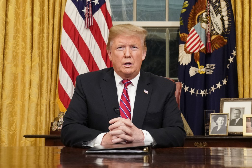 President Donald Trump speaks from the Oval Office of the White House as he gives a prime-time address about border security Tuesday in Washington.