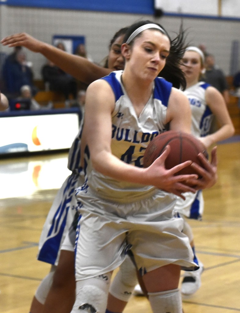 Madison's Brooke Ross grabs a rebound during game against Winthrop on Monday in Madison.