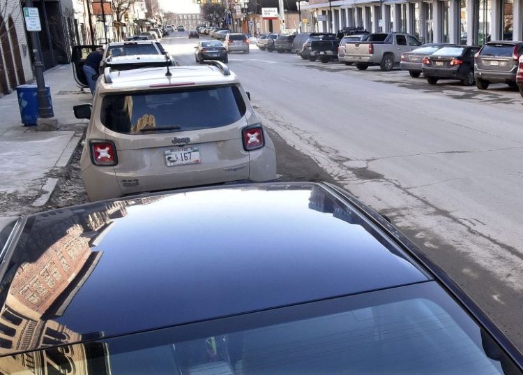 Parking on both sides of Main Street in Waterville, as seen here Thursday, will be reduced if the street is changed to two-way traffic and other infrastructure improvements made with about 65 spots being lost.