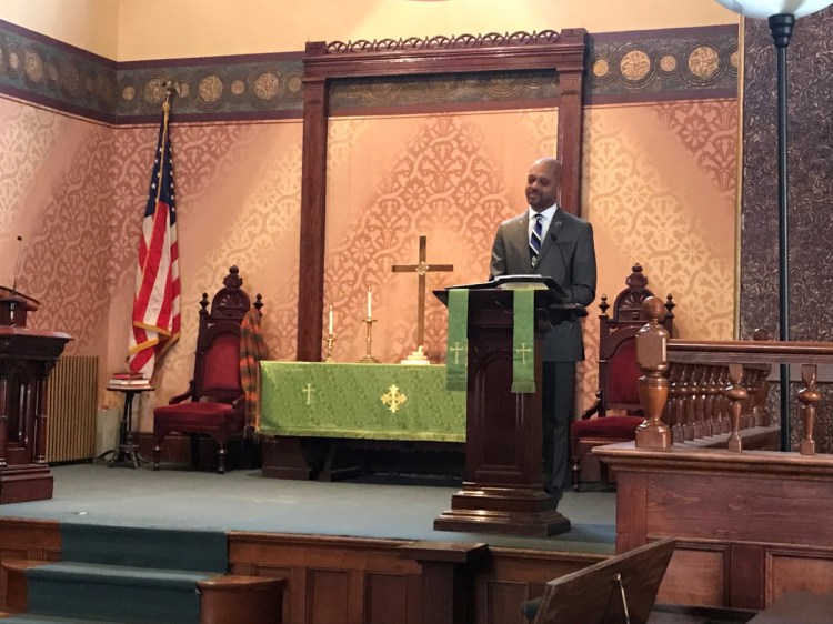 Rep. Craig Hickman, D-Winthrop, speaks to a group gathered at the Old South First Congregational Church Monday in honor of Dr. Martin Luther King Jr., who would have turned 90 years old Jan. 15.