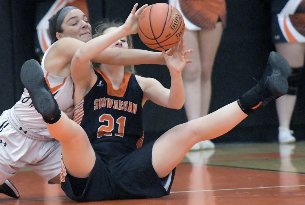 Gardiner's Anna Toman attempts to block Skowhegan's Annie Cooke (21) during a Kennebec Valley Athletic Conference Class A game last Thursday in Gardiner.
