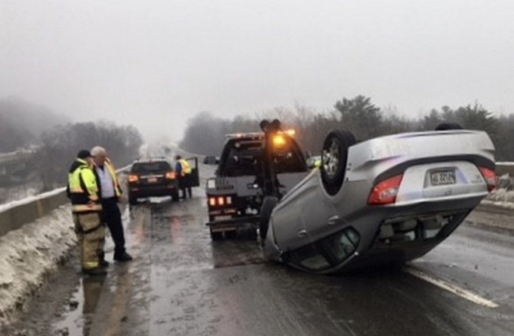 A Newport woman lost control of her Honda Civic on Thursday morning as she was traveling north on Interstate 95. The car struck abutments of the Messalonskee Stream bridge and fliped onto its roof. Rain had started to freeze on the bridge, according to Steve McCausland, the spokesman for the state Department of Public Safety.