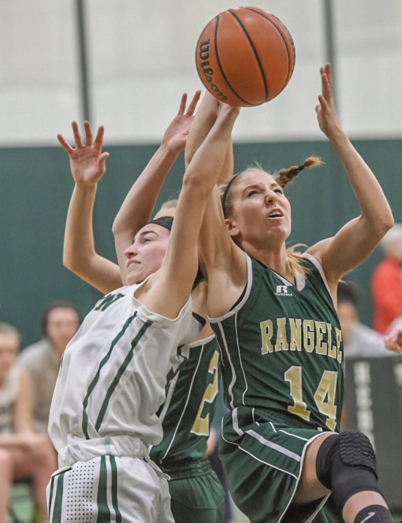 Rangeley's Emily Eastlack, right, battles for a rebound during a game Friday at Hebron Academy.