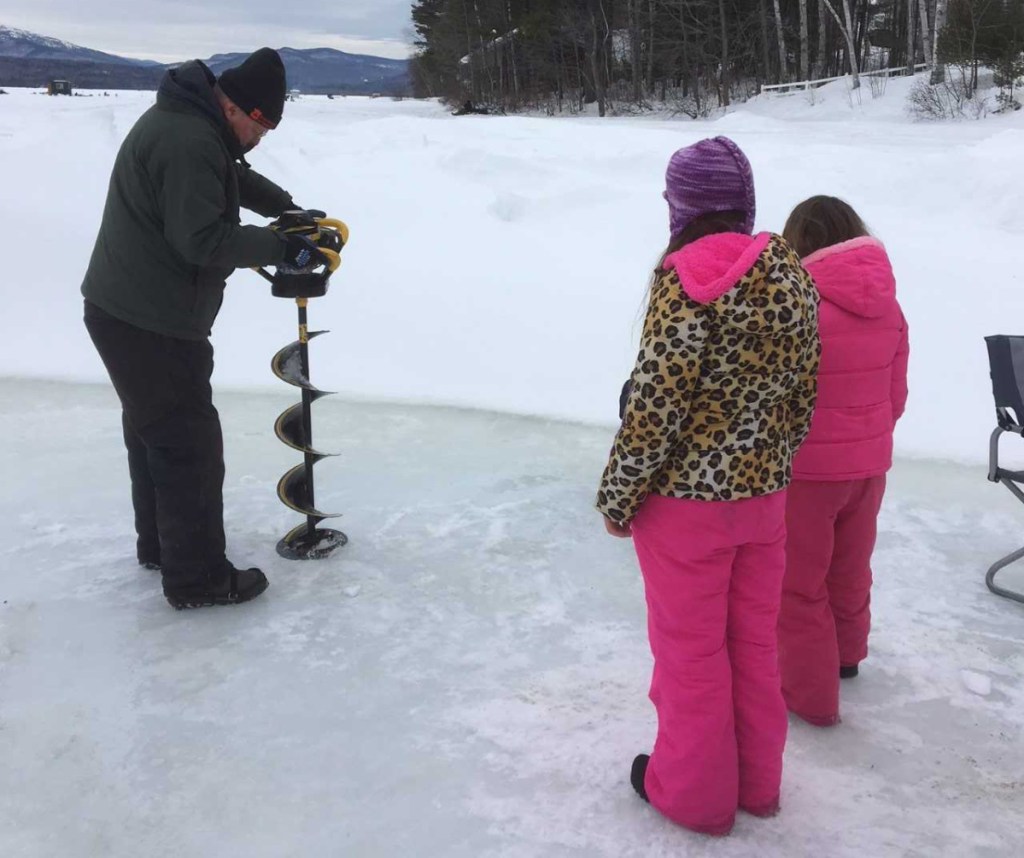 Alan Hart, a member of the Wilton Fish and Game Association, demonstrates the use of a power auger for ice fishing as part of the annual Michael J. Rowe Memorial Ice Fishing Derby on Wilson Lake. This year's derby is set for Feb. 16.