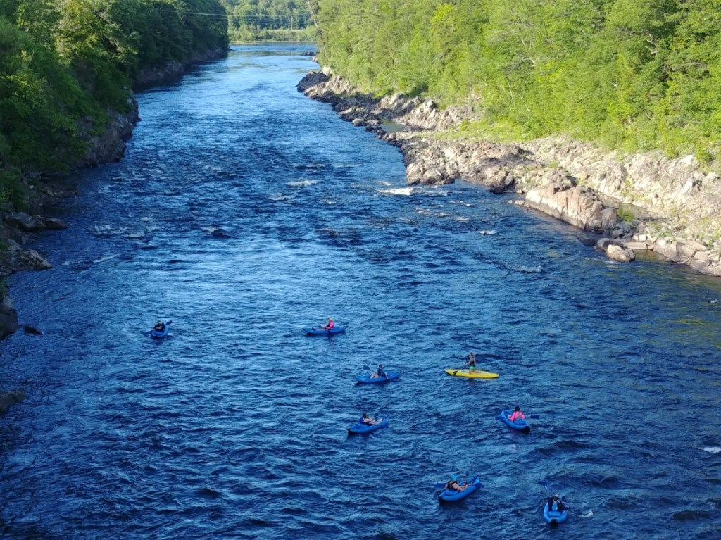 A view down the Kennebec River in Skowhegan from the walking bridge, taken in June 2018.