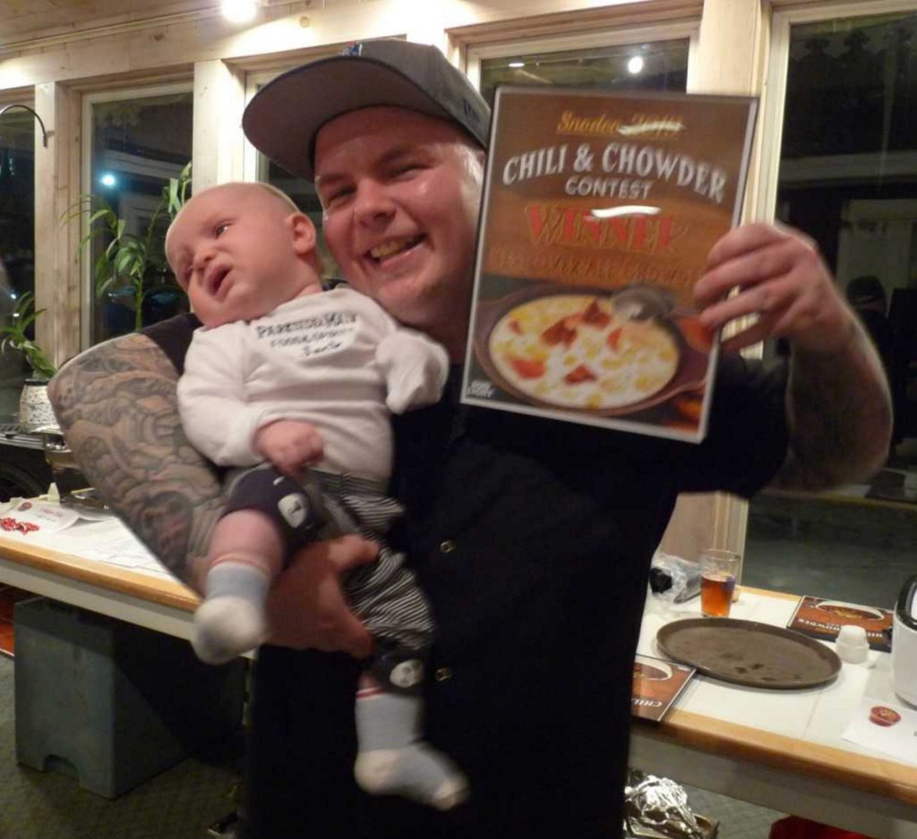 Jarrod Beedy, with "assistant" Jack, representing Parkside & Main, winner of Best Overall Chowder contest hosted by the Rangeley Lakes Chamber of Commerce.