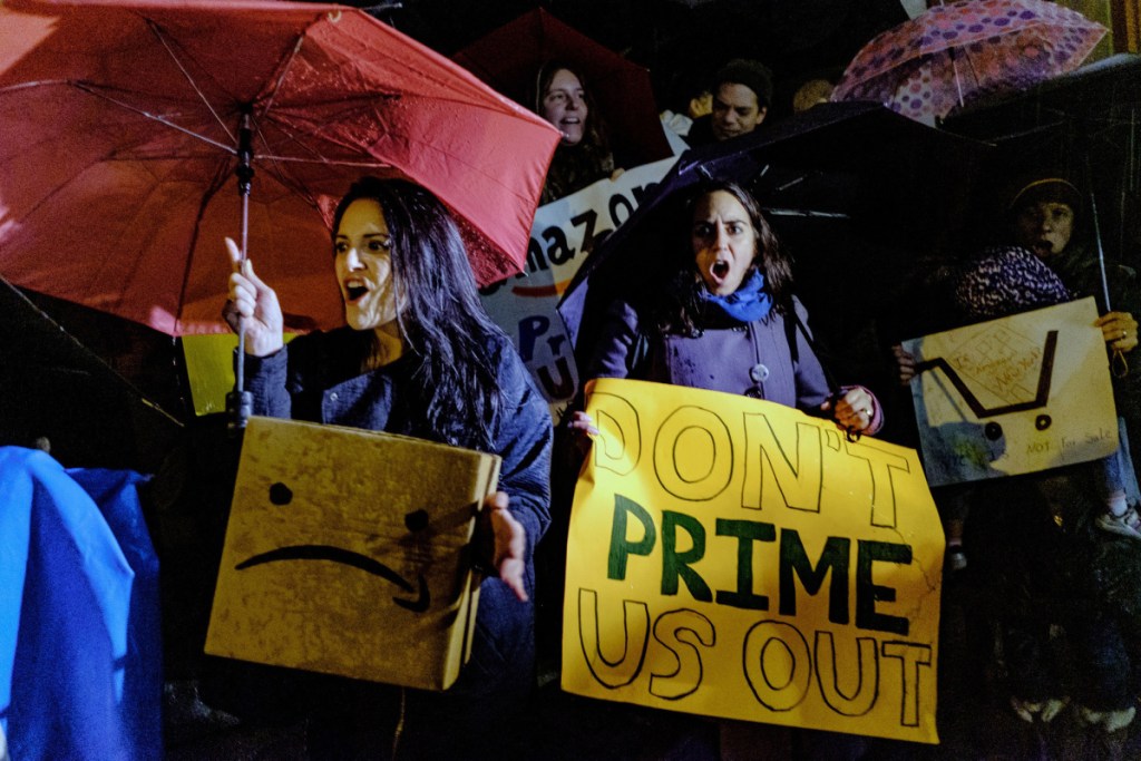 Demonstrators protest against the planned Amazon.com office hub in Long Island City, located in the New York city borough of Queens, on Nov. 26, 2018. MUST CREDIT: Bloomberg photo by Christopher Lee.