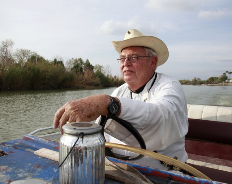 Roy Snipes, pastor of the La Lomita Chapel, shows Associated Press journalists the land on either side of the Rio Grande in Mission, Texas, on Tuesday. Portions of Snipes' church land could be seized by the federal government to construct additional border wall and fence lines. Rather than surrender their land to the government, some property owners are digging in to fight President Trump's border wall, rejecting buyout offers and preparing to battle the administration in court.