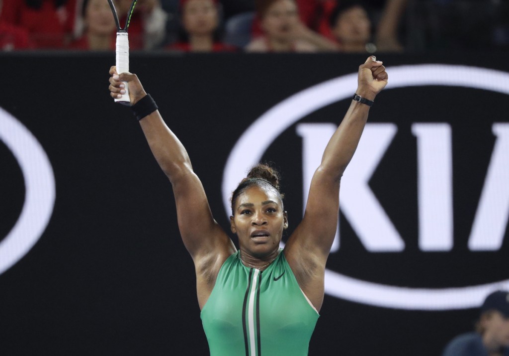 Serena Williams celebrates after defeating Simona Halep in their fourth round match at the Australian Open on Monday in Melbourne, Australia.