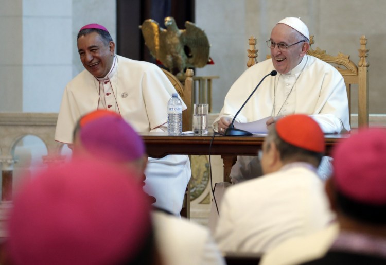 Pope Francis, right, and Panama Archbishop Jose Domingo Ulloa meet with bishops at the St. Francis of Assisi Church in Panama City on Thursday.