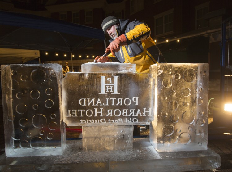 Jeff Day, of Ice Designs, works on an ice bar Wednesday for Portland Harbor Hotel's annual ICEBAR weekend.
