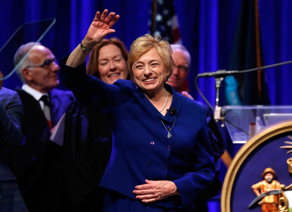 Gov. Janet Mills acknowledges applause after taking the oath of office Wednesday. Mills, a Democrat, is the state's first woman to serve as governor. 