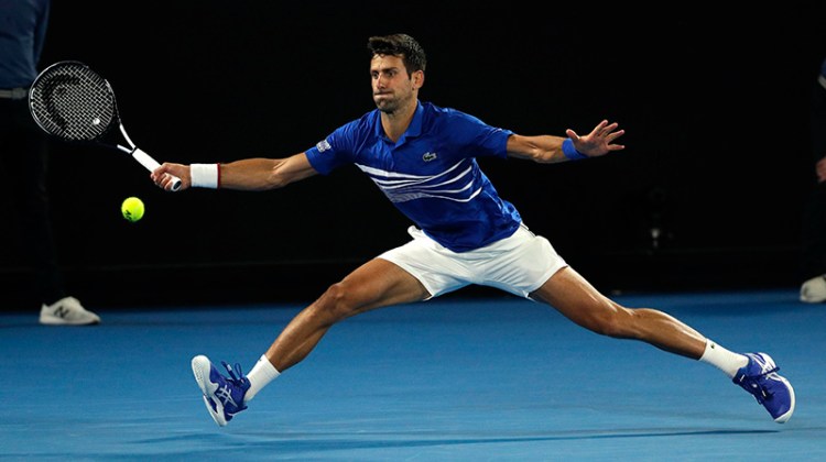 Novak Djokovic makes a forehand return to Lucas Pouille during their semifinal match at the Australian Open tennis championships in Melbourne on Friday.