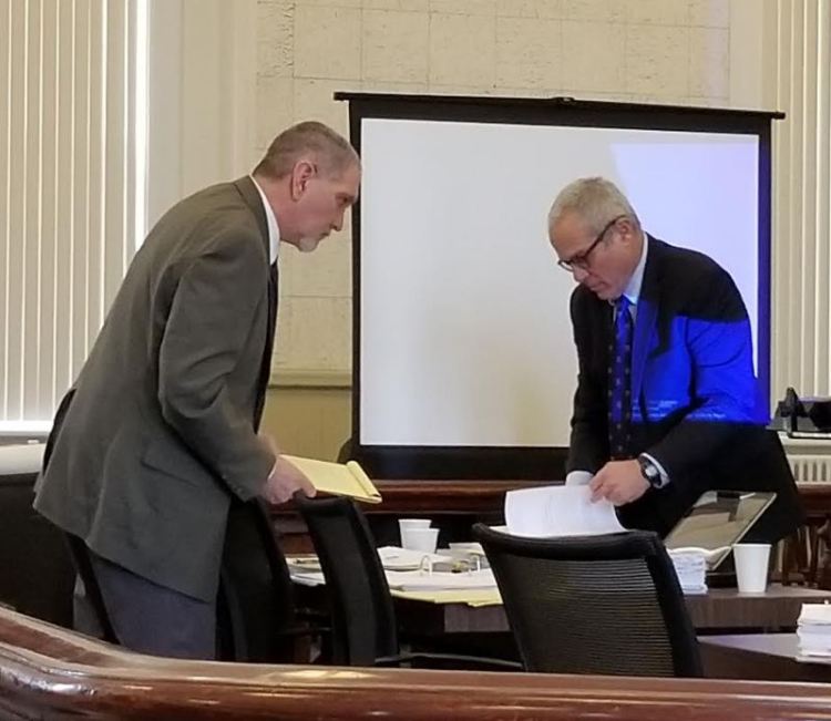 James Sweeney, left, formerly of Jay, and his co-defense lawyer, Walter Hanstein, confer during a break Thursday, the third day of Sweeney's murder trial at Franklin County Superior Court in Farmington. 