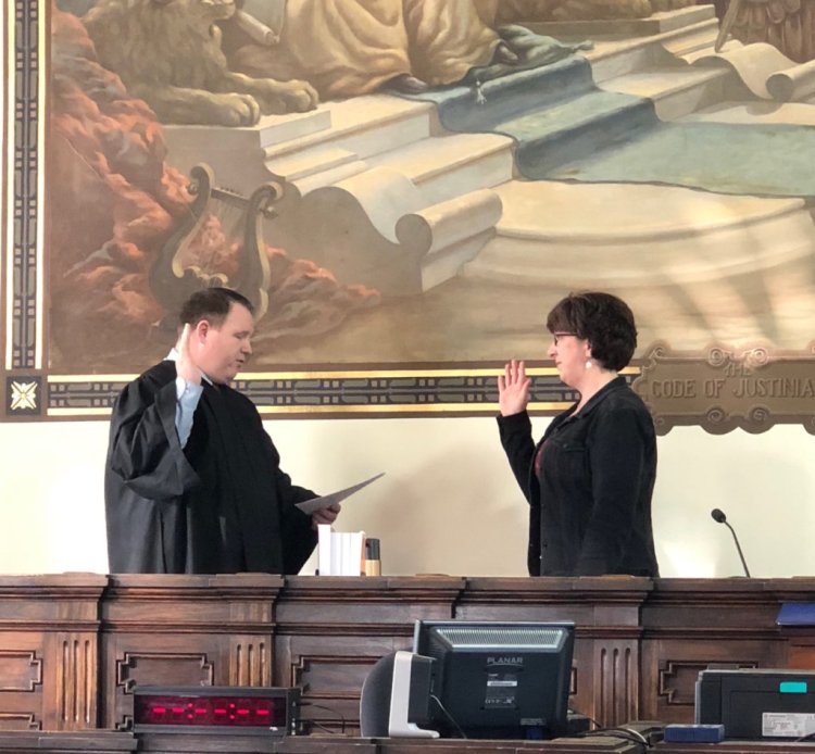 Cherri Crockett of Bethel is sworn in as the Oxford County register of deeds by Oxford County Probate Judge Jared Crockett on Dec. 31, 2018, at the Oxford County Courthouse in Paris.
