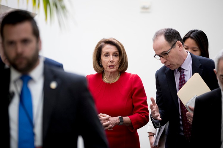 House Speaker Nancy Pelosi of Calif. leaves a House Democratic Caucus meeting on Capitol Hill on Wednesday.