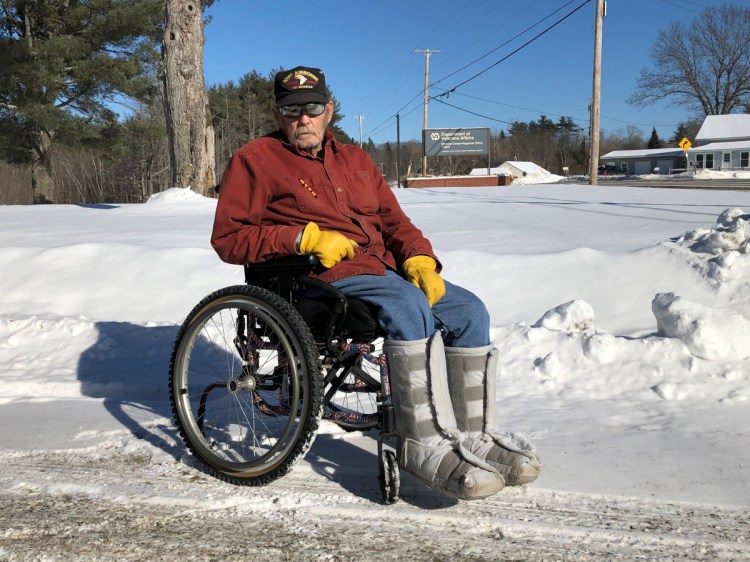 Vietnam veteran Ron Wills poses for a photo Friday outside the Togus VA facility in Augusta.