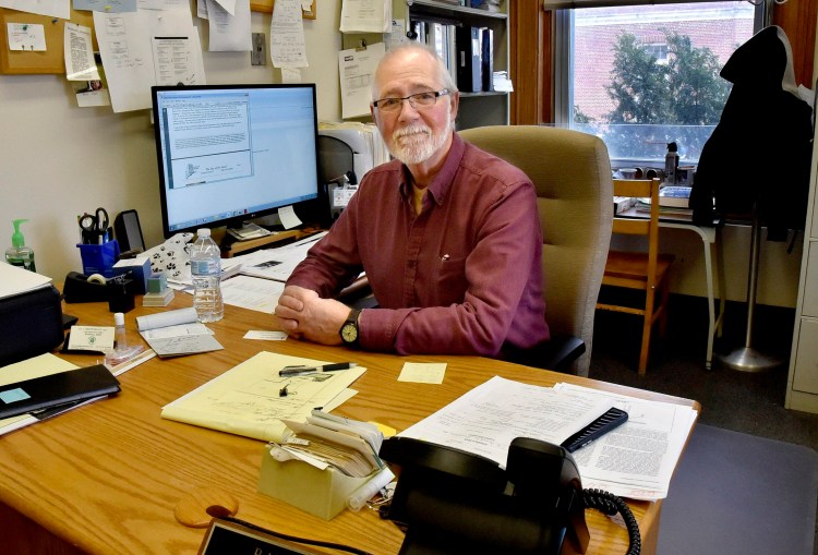 Randy Gray, shown Tuesday in his office in Skowhegan, has been the town's code enforcement officer for nearly 40 years and will retire this June. Gray said he has enjoyed his many years of working and will miss his staff, which he described as "the best."