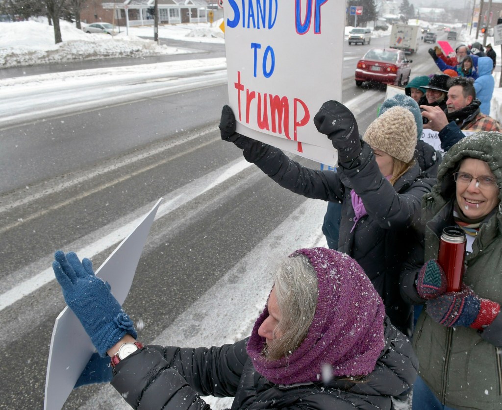 Protestors gather Monday outside the Muskie Federal Building in Augusta to protest the emergency declaration issued by President Donald Trump to create a wall between the United States and Mexico.