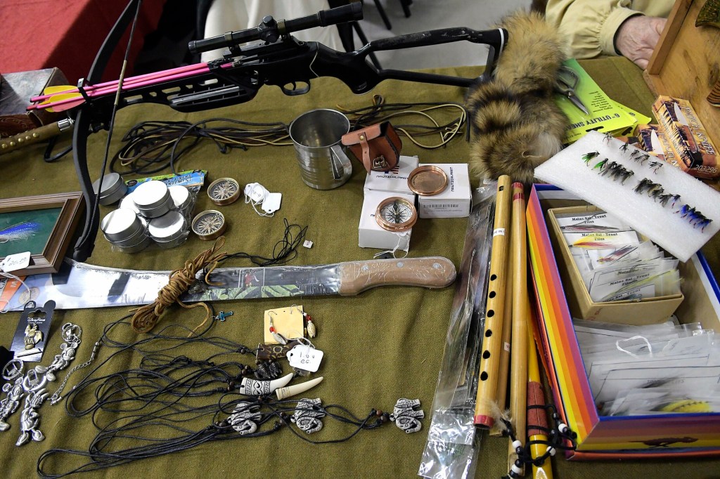 Items for sale on Sunday at the Ancient Ones show in Augusta included guns, flies, compasses and crossbows.