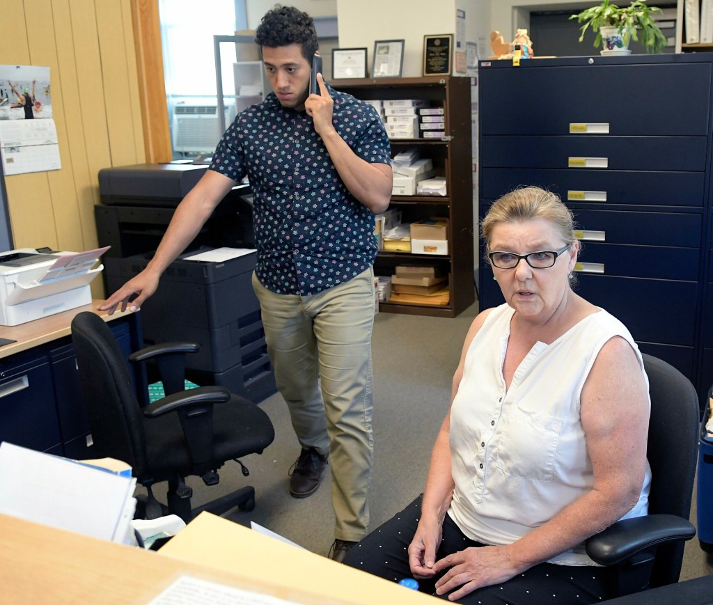 Dresden Clerk and Treasurer Shirley Storkson and administrative assistant Michael Henderson work at the Dresden Town Hall on Aug. 21, 2018.