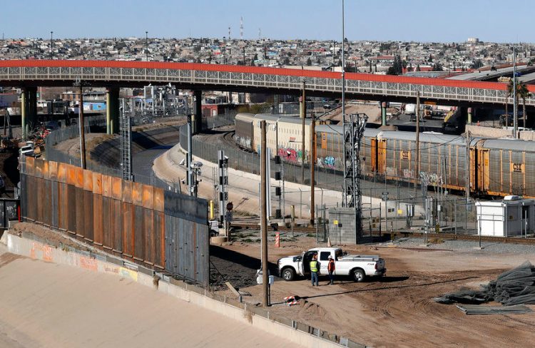 A new barrier is built along the Texas-Mexico border near downtown El Paso on Jan. 22, 2019. Such barriers have been a part of El Paso for decades and are currently being expanded, even as the fight over President Donald Trump's desire to wall off the entire U.S.-Mexico border. 