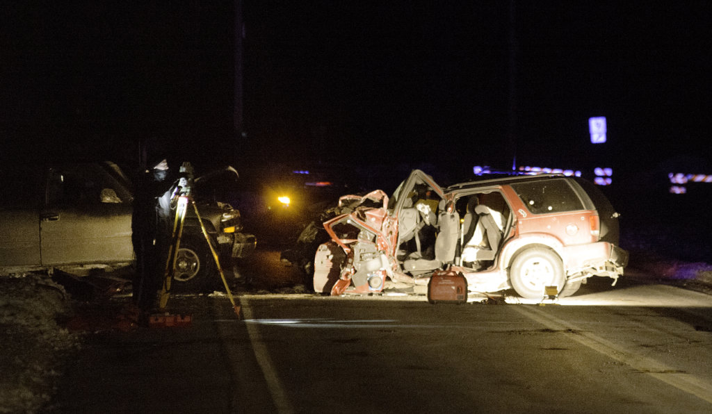 Police reconstruct the two-vehicle accident on Route 9 in Lisbon on Friday.