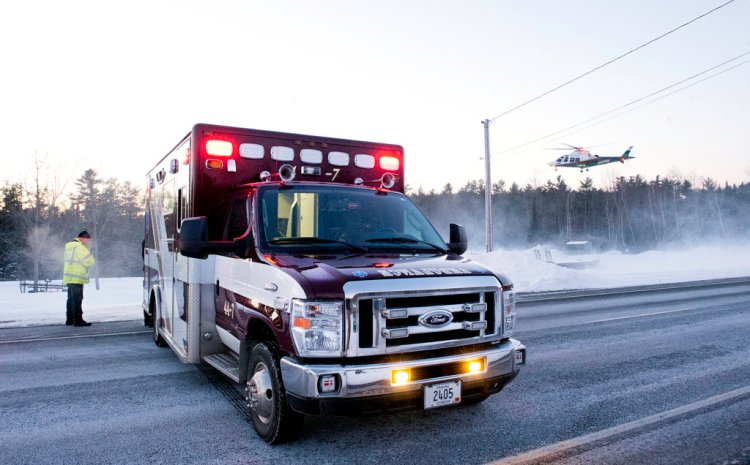 Lifeflight of Maine lifts off from the side of Route 9 as an Lisbon Emergency ambulance blocks traffic in Lisbon on Friday evening.