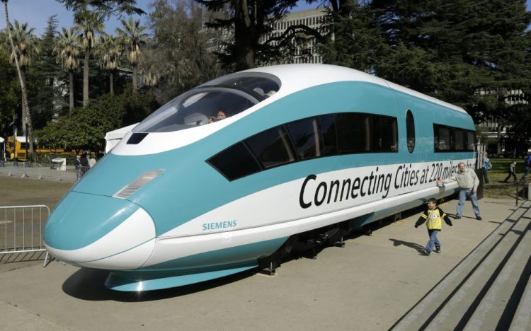 This Feb. 26, 2015, photo shows a full-scale mock-up of a high-speed train, displayed at the Capitol in Sacramento, Calif. 