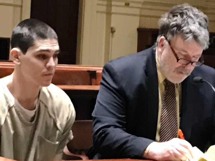 Brian Krafton of Monmouth sits with his attorney, Donald Hornblower, in Androscoggin County Superior Court on Tuesday for a robbery sentencing.