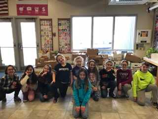 Clinton Elementary School students recently held a "Souper Bowl" food drive competition. Kierra Moody is in front. Back from left are 
Paige Maxell, Jenna Furchak, Jillian Boyden, Jocelyn Clark, Kailynn Brasher, Kylie Delile, Paige Strout-Desmond, Kaylie Smith and Colton Carter.