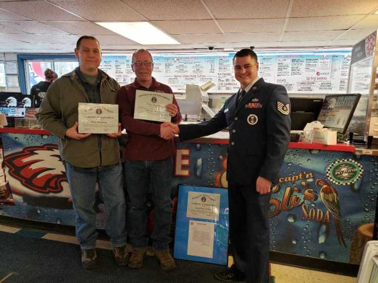 Doug Dickinson, left, and Todd Thibodeau, recently were presented with Honorary Recruiter Certificates from Tech. Sgt. Michael Lujan with the Air Force.