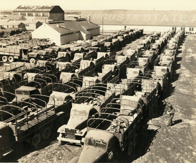 Photograph taken circa 1950s after the establishment of the Augusta State Airport up on the top of the hill adjacent to Camp Keyes. The vehicles are a mixture of Army trucks common at the time.