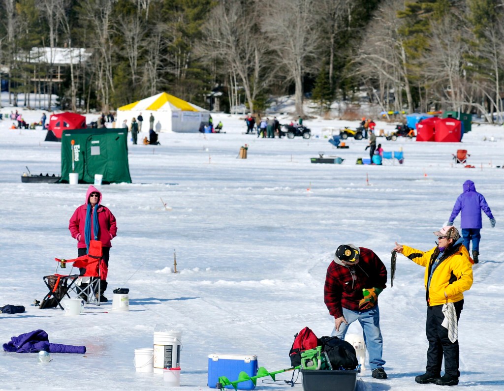 Anglers crowd Cochnewagon Lake in Monmouth during the fourth annual Jack Traps Youth Ice Fishing Derby on Feb. 22, 2013. The ice fishing derby is back for its 10th year on Saturday.