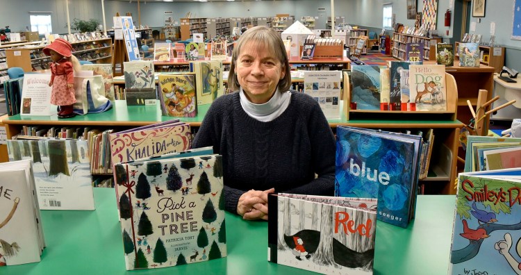 Winslow Public Library Director Pamela Fesq Bonney, on Monday, is looking forward to a new hire arriving next week who will take charge of the children's section, which is the beneficiary of a recent donation.