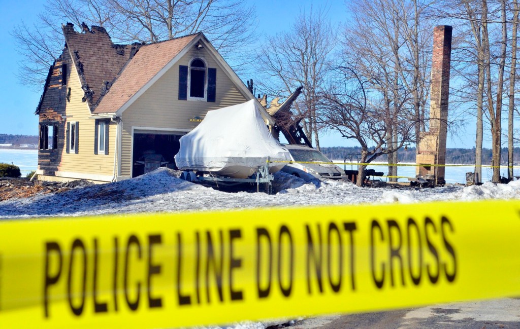 This photo, taken Wednesday, shows the fire ravaged house at 74 Poppy Lane in Sidney.