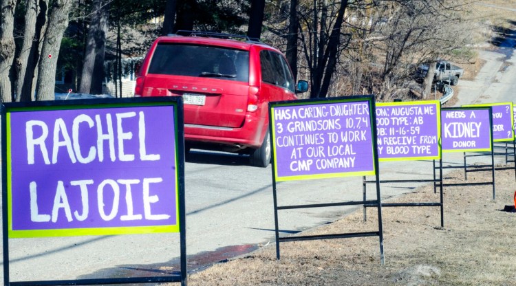 A series of signs seeking a kidney donation for Rachel Lajoie faces drivers Tuesday on South Belfast Avenue (Route 105) in Augusta.