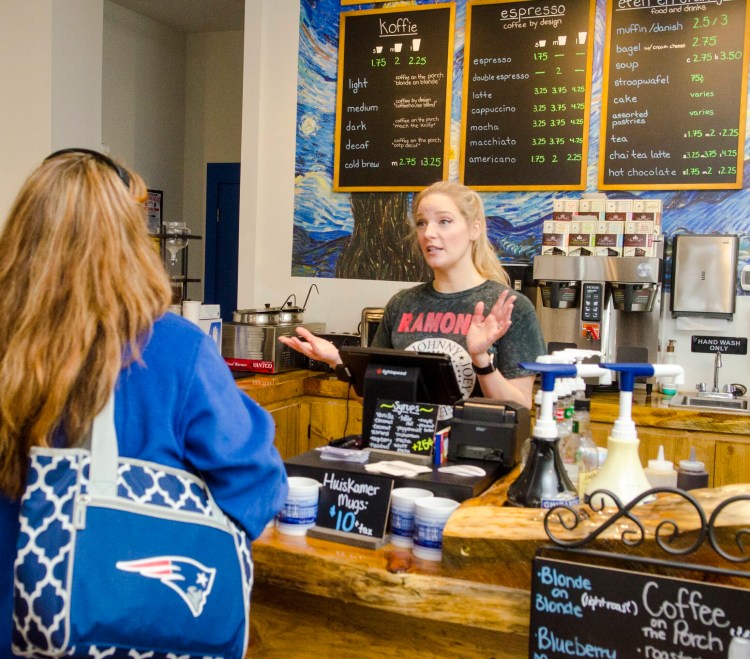 Grace Fectueau waits on customers at Huiskamer Coffee House in downtown Augusta in this March 29, 2019 file photo.