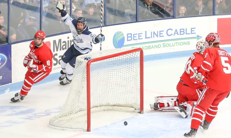 University of Maine's Brendan Robbins celebrates a first-period goal against Boston University at Alfond Arena in Orono last season. Robbins is one of many players who graduated or turned pro last spring, leaving the current Black Bears with a number of unproven players entering this season.