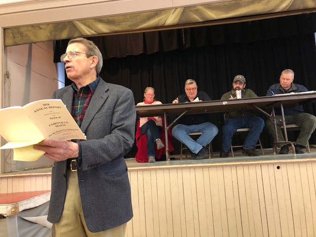 Peter Mills moderates Cornville's Town Meeting on Saturday at the Town Hall. A Cornville resident, Mills also is executive director of the Maine Turnpike Authority. Behind him, from left, are town Clerk Tammy Chamberland, Board of Selectmen Chairman Mel Blaisdell and selectmen Michael Gould and Rick Oberg.
