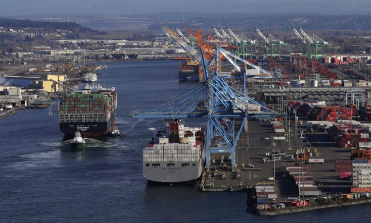 A container ship heads into the Port of Tacoma on March 5.