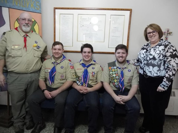 Adam DeWitt, 18, of Sidney, received his Eagle Scout medal, patch and certificate March 16 at St. Mark's Episcopal Church in Waterville. From left are John DeWitt, father of Eagle Scout sons Alex, Adam and Spencer DeWitt, and Sara DeWitt, mother. 