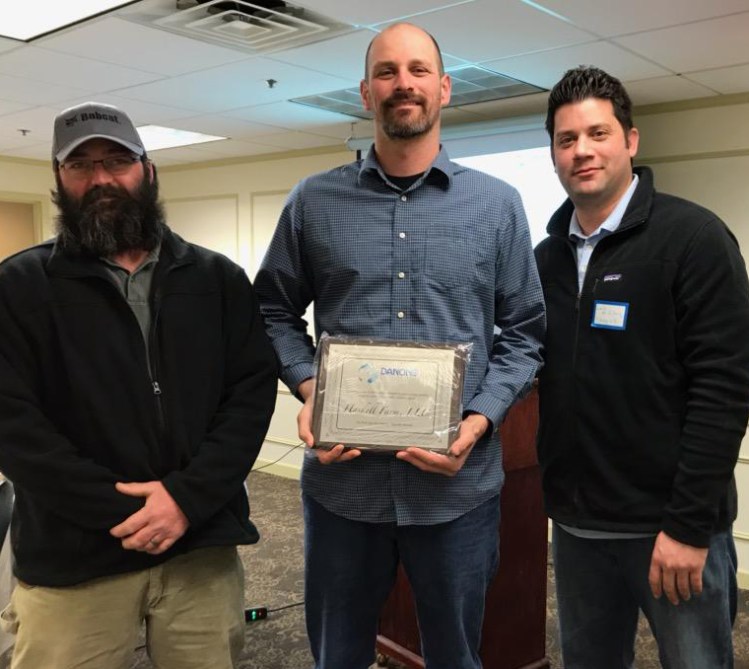 Haskell Farm in Palermo has been awarded a 2018 Top Ten National Quality Award from Danone North America. The farm was recognized as No. 5 in the United States for its commitment to producing quality organic milk. From left are Matt Avery, farm manager; Jesse Haskell, a farm co-owner; and Luis de la Cruz, senior manager, Danone North America.