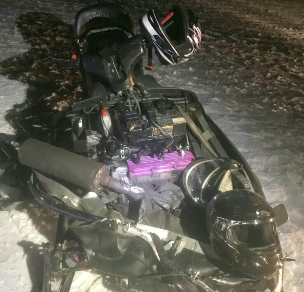 The snowmobile driven by Tyler Graham, 27, of Brunswick was demolished in a head-on collision on Rangeley Lake on Saturday night. Graham, his passenger and the other snowmobile driver were injured. 