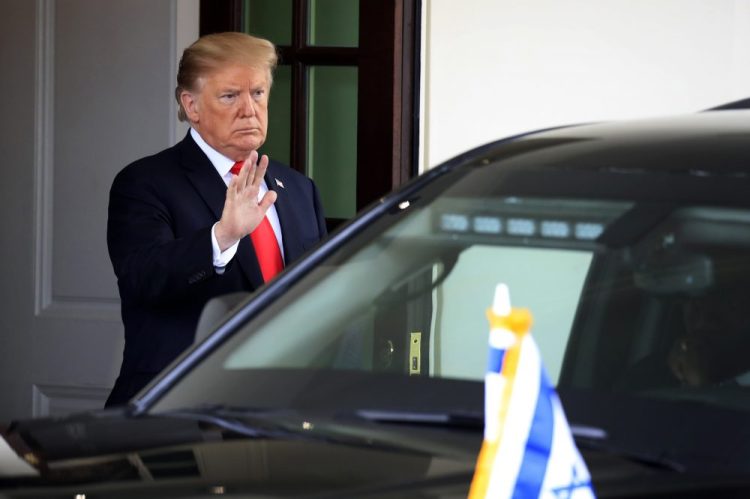 President Donald Trump waves as Israeli Prime Minister Benjamin Netanyahu leaves the White House in Washington, Monday, March 25, 2019. 