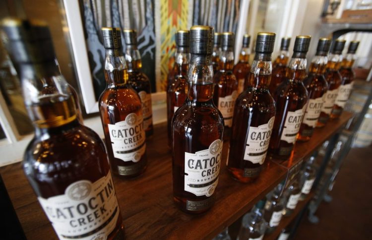 Catoctin Creek Distillery whiskey is on display in a tasting room in Purcellville, Va. on June 20, 2018.