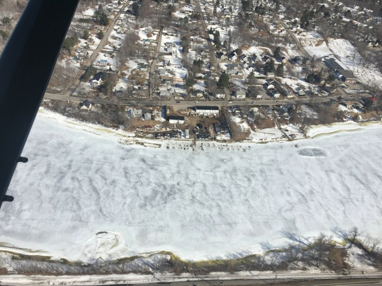An aerial view of Worthing's Smelt Camps in Randolph, taken Wednesday, shows the frozen Kennebec River.