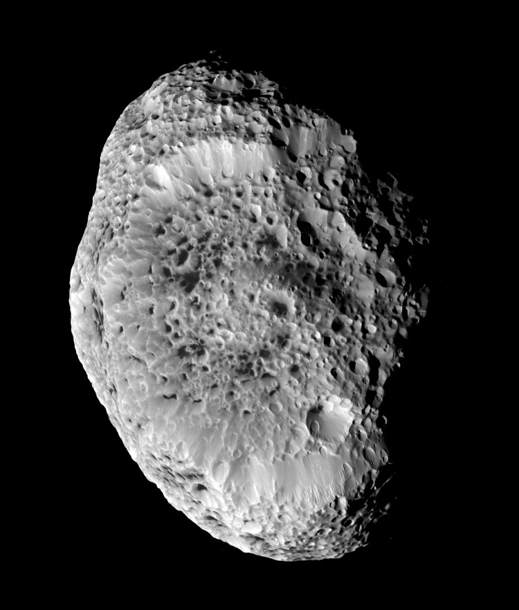 Saturn's impact-pummeled moon Hyperion stares back at NASA's Cassini in this six-image mosaic taken during the spacecraft’s close approach on Sept. 26, 2005.