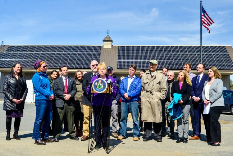 Gov. Janet Mills speaks during Tuesday's signing ceremony for a solar energy bill at Rocky's Stove Shop in Augusta. The shop's 83 solar panels produce enough electricity to power the store, two warehouse and three homes, according to the shop's manager, Ashley Gaslin.